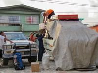 <p> Loading the minivan for a 16 hour Georgetown-Annai overnight trip. </p>